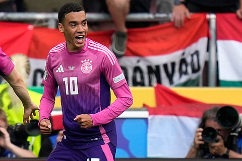 Jamal Musiala celebrates after scoring Germany's opening goal